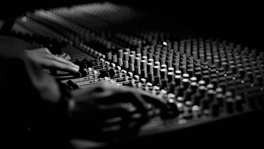 Mixing desk. Photo credit: Filip Barna (Unsplash)